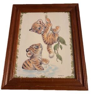 Art Work Of 2 Baby Tigers Playing In Water And On Vines. Wood Frame  Is 10”x12”